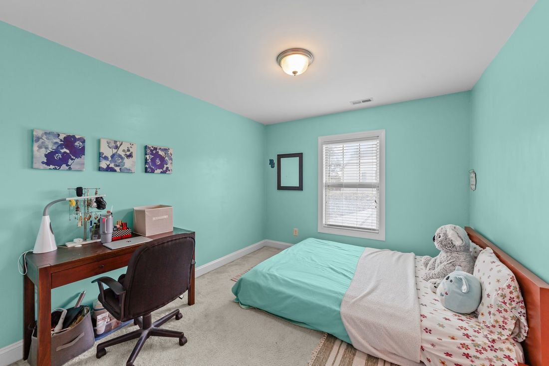 Bedroom 2 · Full bed · Desk · Natural light